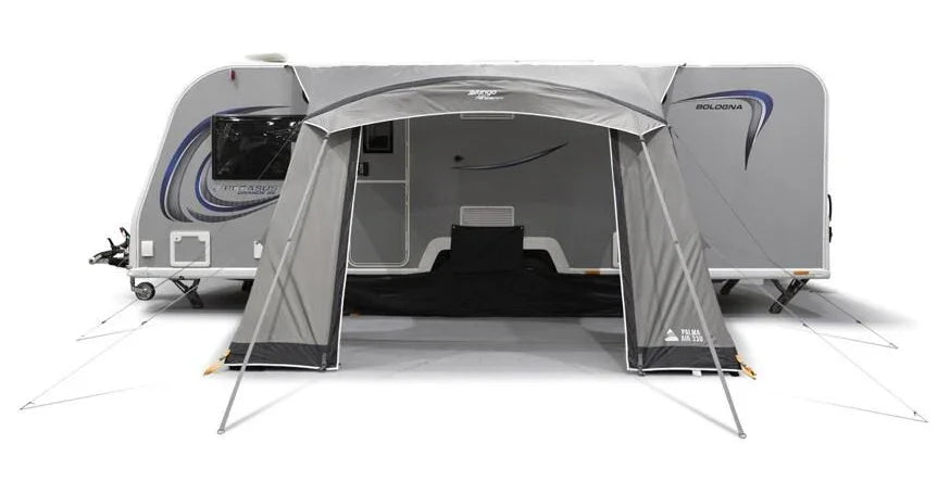 Grey caravan awning attached to Bologna caravan, ideal for camping and outdoor adventures