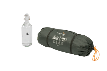 Easy Camp Sarek 2 compact camping tent in carry bag with 1L bottle for scale, ideal for outdoor adventures