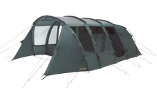 Large family camping tent with multiple rooms and orange guy lines for outdoor adventures