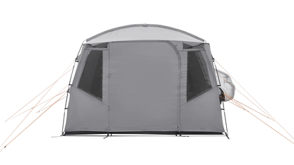 Gray caravan awning with orange guy lines attached to a vehicle for outdoor camping adventures