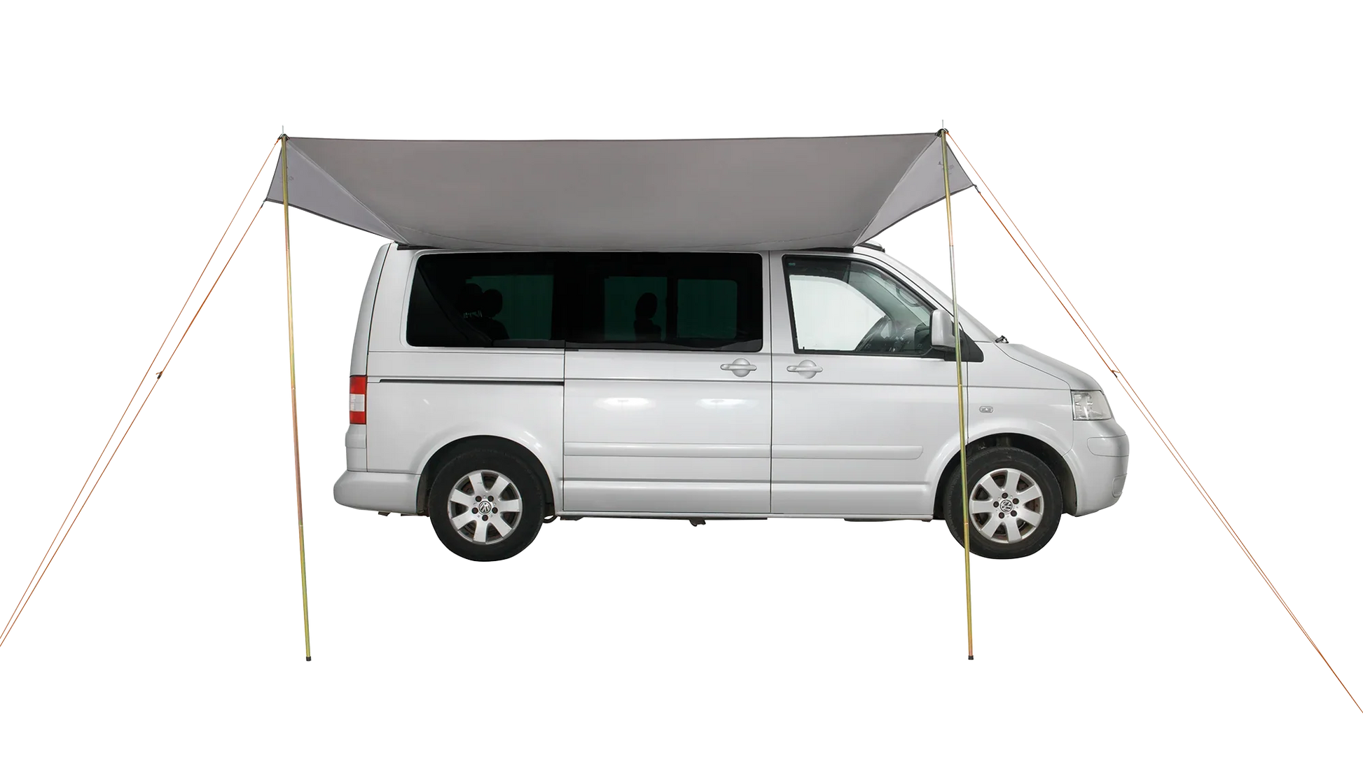 White van with motorhome awning extended for outdoor camping adventures