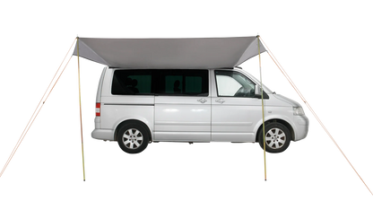 White van with motorhome awning extended for outdoor camping adventures