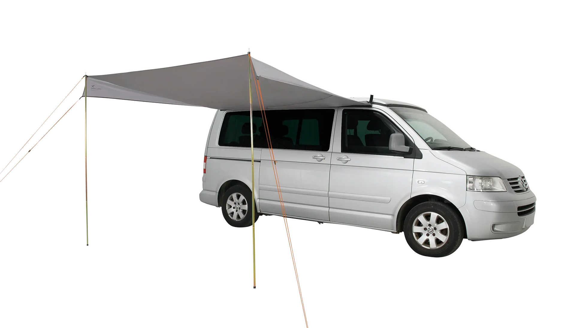 Motorhome awning attached to silver van for outdoor camping adventures