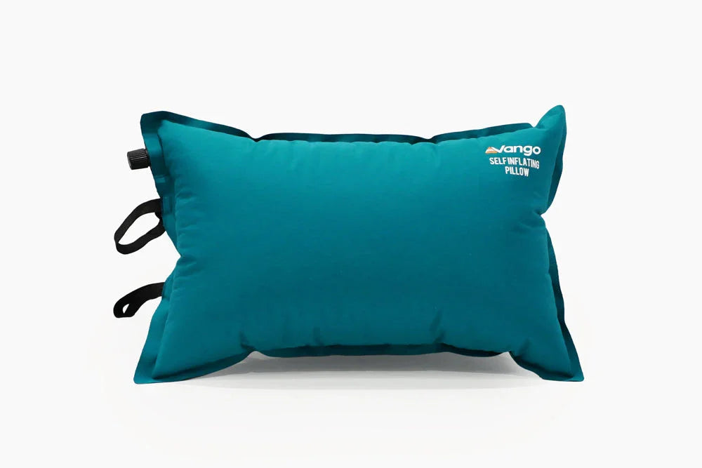 Teal Vango self-inflating camping pillow with carry straps for outdoor adventures