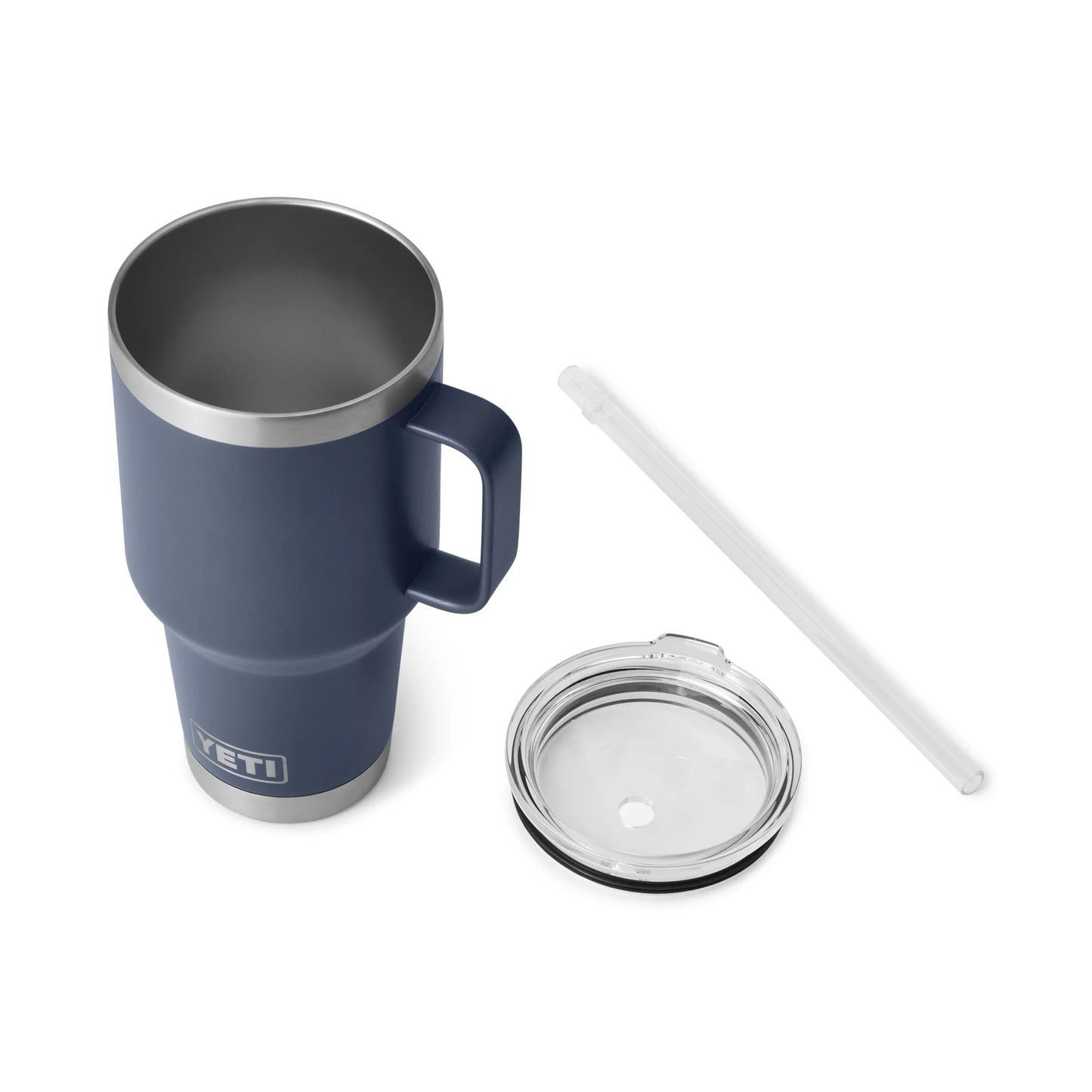 Navy blue Yeti travel mug with clear lid and straw, ideal for camping and outdoor adventures.