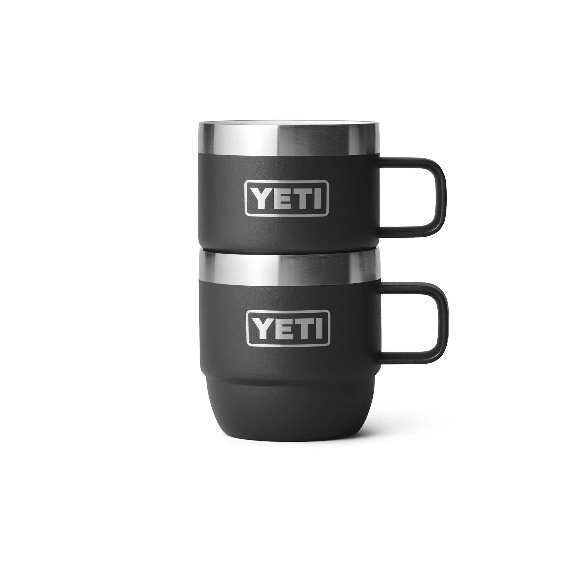 Two black YETI insulated mugs stacked, ideal for camping and outdoor adventures