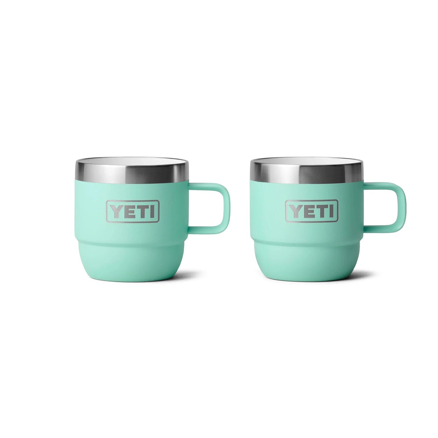 Mint green Yeti insulated mugs with handles for camping and outdoor adventures