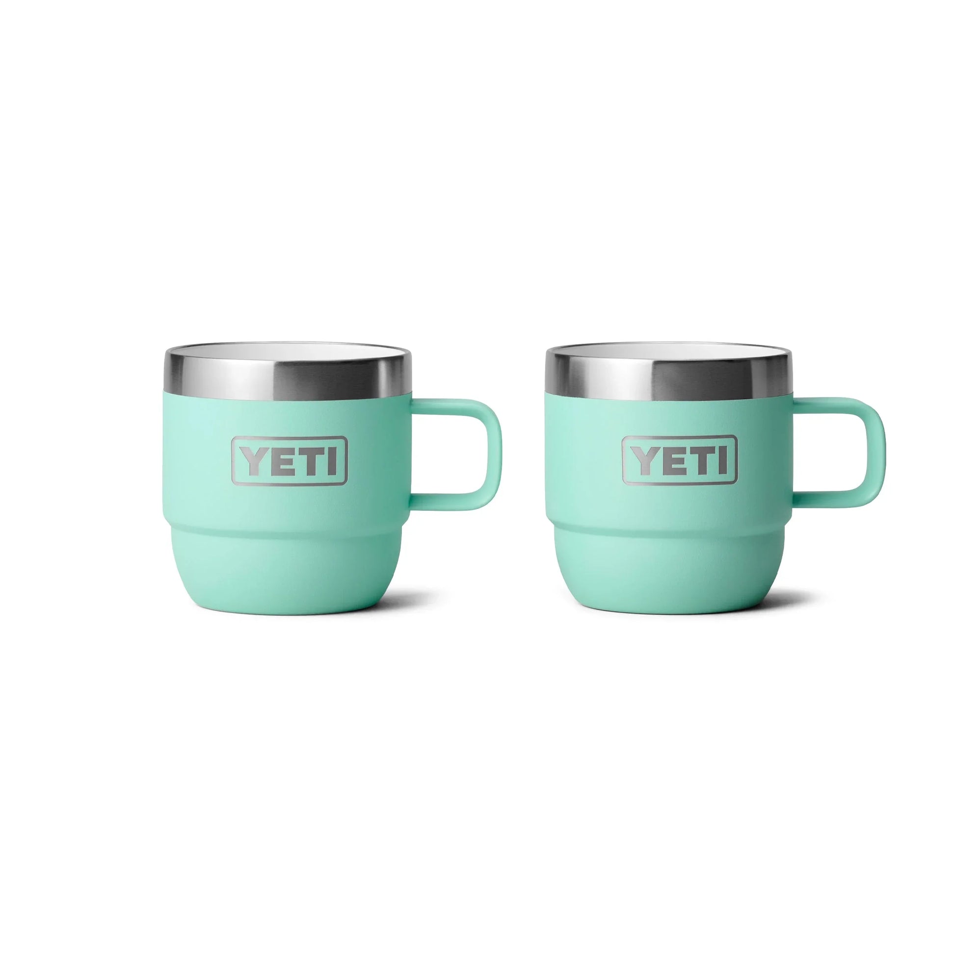 Mint green Yeti insulated mugs with handles for camping and outdoor adventures