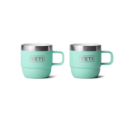 Mint green Yeti insulated mugs with handles for camping and outdoor adventures