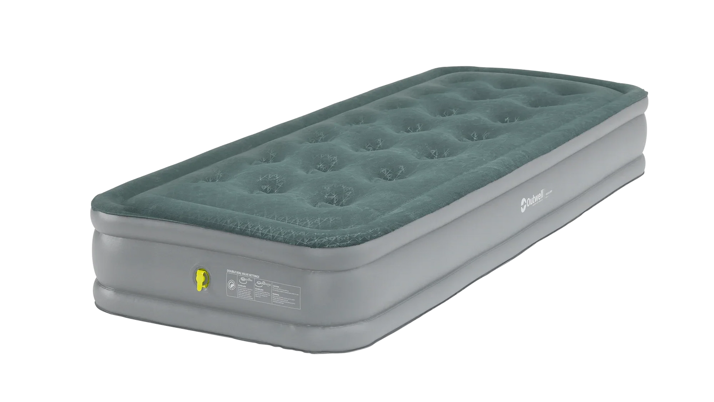 Green and gray inflatable air mattress with Outwell branding for camping and outdoor use