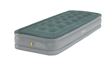 Green and gray inflatable air mattress with Outwell branding for camping and outdoor use