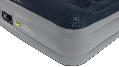 Inflatable camping air mattress with built-in pump and geometric patterned surface