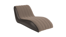 Inflatable camping lounger with brown fabric top and dark base, ideal for outdoor relaxation and caravanning adventures.
