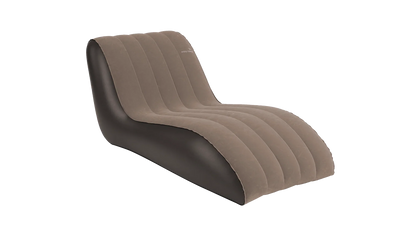 Inflatable camping lounger with brown fabric top and dark base, ideal for outdoor relaxation and caravanning adventures.