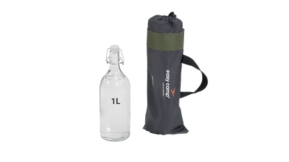 1L glass water bottle with swing top lid next to easy camp carry bag for camping and outdoor adventures