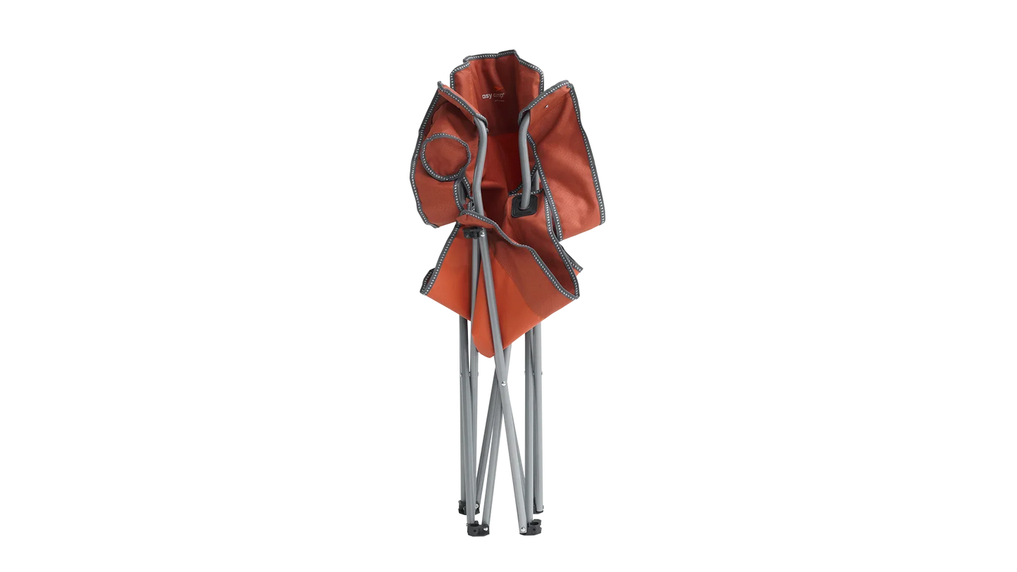 Orange folding camping chair with metal frame, ideal for outdoor adventures and portable comfort.