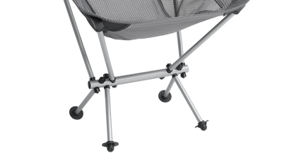 Grey mesh camping chair with silver metal frame and black feet, ideal for outdoor adventures and caravanning.
