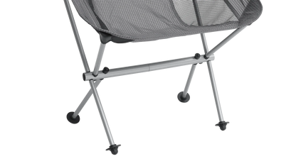 Grey mesh camping chair with silver frame and black feet, ideal for outdoor adventures and caravanning trips.