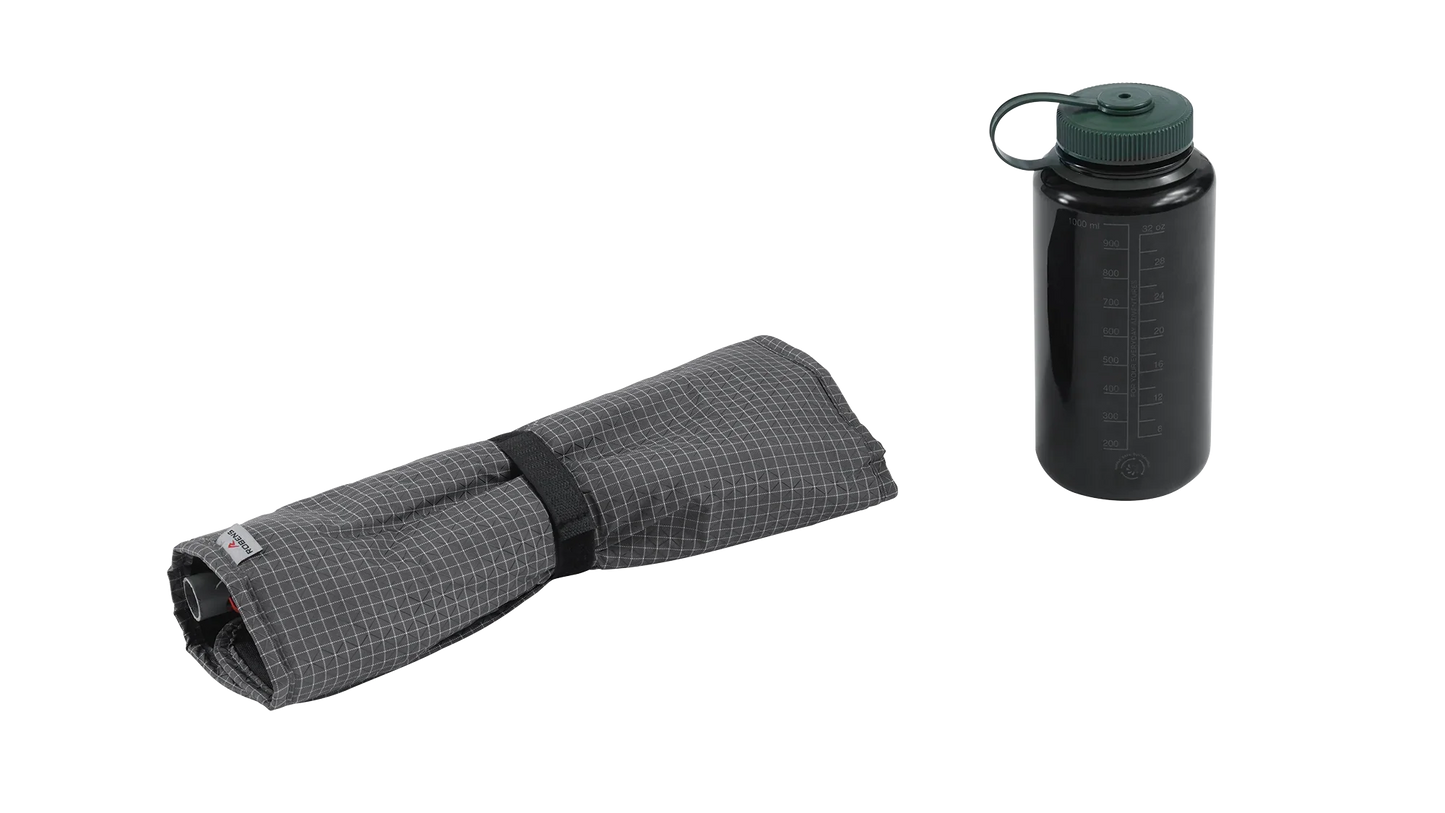 Compact camping water bottle with carrying sleeve, ideal for outdoor adventures and hydration on the go.