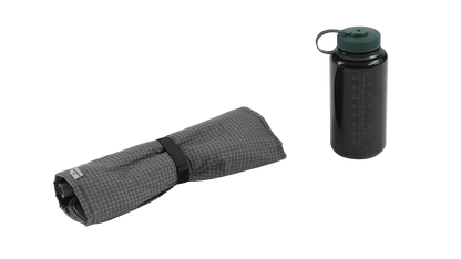 Compact camping water bottle with carrying sleeve, ideal for outdoor adventures and hydration on the go.