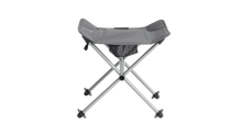 Portable camping stool with mesh seat and storage pouch, ideal for outdoor adventures and caravanning.