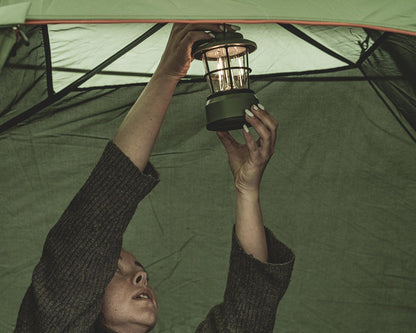 Camping lantern inside tent for outdoor adventure lighting
