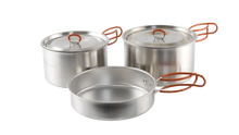 Stainless steel camping cookware set with orange handles for outdoor cooking adventures