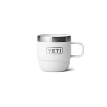 White YETI insulated mug with stainless steel rim, ideal for camping and outdoor adventures.