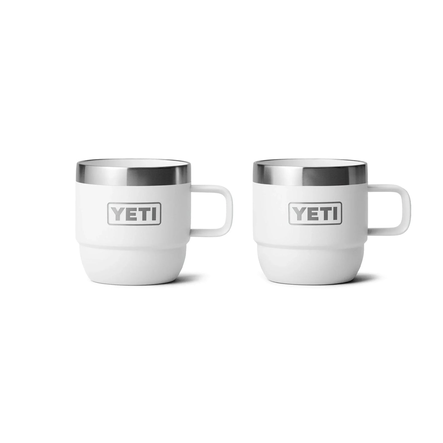 White YETI insulated mugs with handles, perfect for camping and outdoor adventures