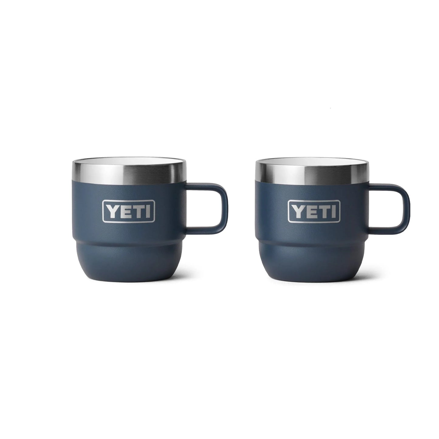 Two navy Yeti insulated mugs with handles, ideal for camping and outdoor adventures.