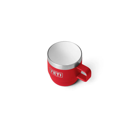 Red YETI insulated camping mug with handle, ideal for outdoor adventures and caravanning