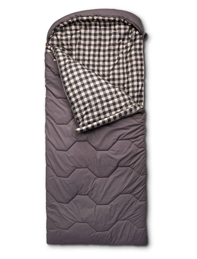 Grey quilted sleeping bag with black and white checkered interior, ideal for camping and outdoor adventures.