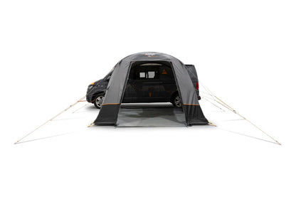 Black motorhome awning attached to van, ideal for camping and outdoor adventures