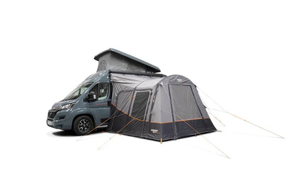 Motorhome awning attached to campervan for outdoor camping adventures