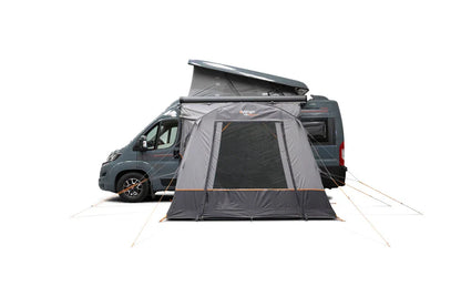 Motorhome awning attached to van for outdoor camping adventures