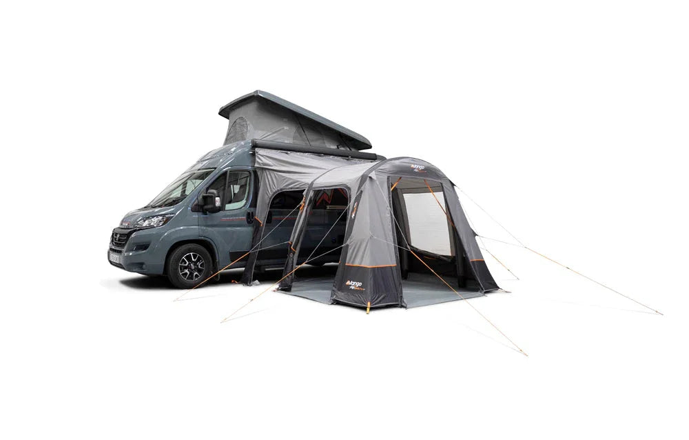 Motorhome awning attached to van for outdoor camping adventures