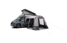 Motorhome awning attached to van for outdoor camping adventures