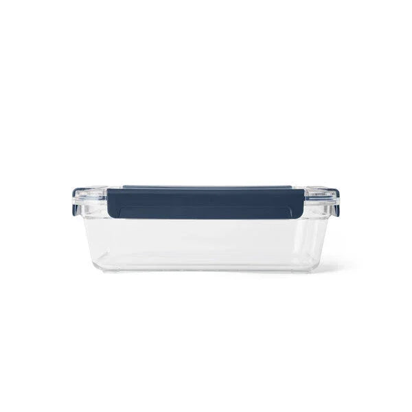Clear plastic food container with navy blue lid for camping and outdoor meals