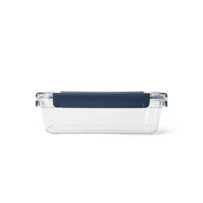 Clear plastic food container with navy blue lid for camping and outdoor meals