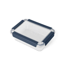 Clear plastic food container with navy blue lid for camping and outdoor meals