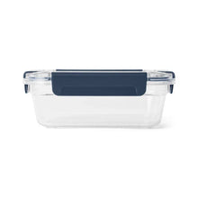Clear plastic food container with navy blue locking lid for camping and outdoor cooking storage