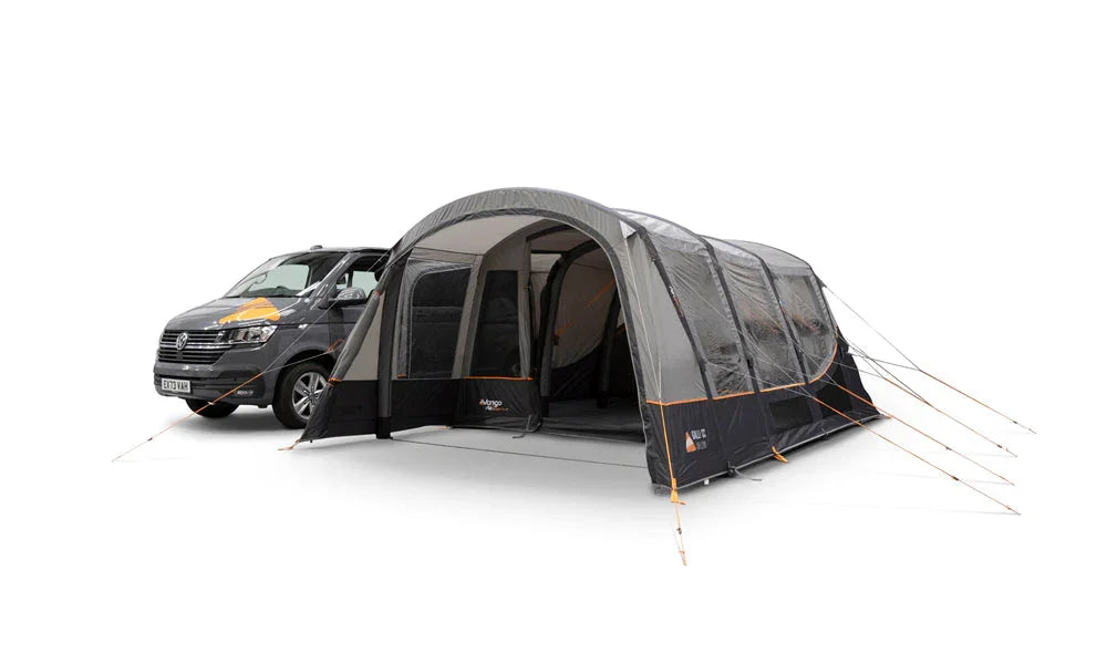 Camping tent attached to a van on a white background