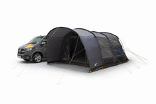Black motorhome awning attached to van, ideal for camping and outdoor adventures with spacious shelter.