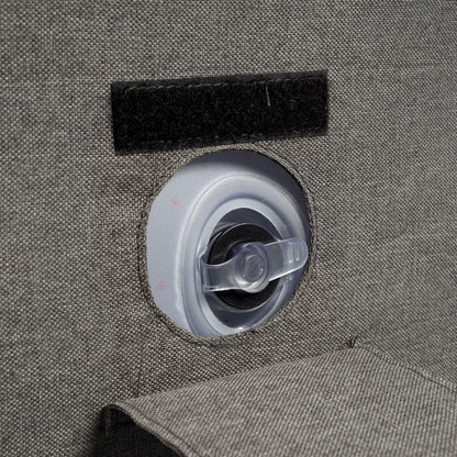 Grey camping chair with integrated drink holder and Velcro strap for outdoor adventures