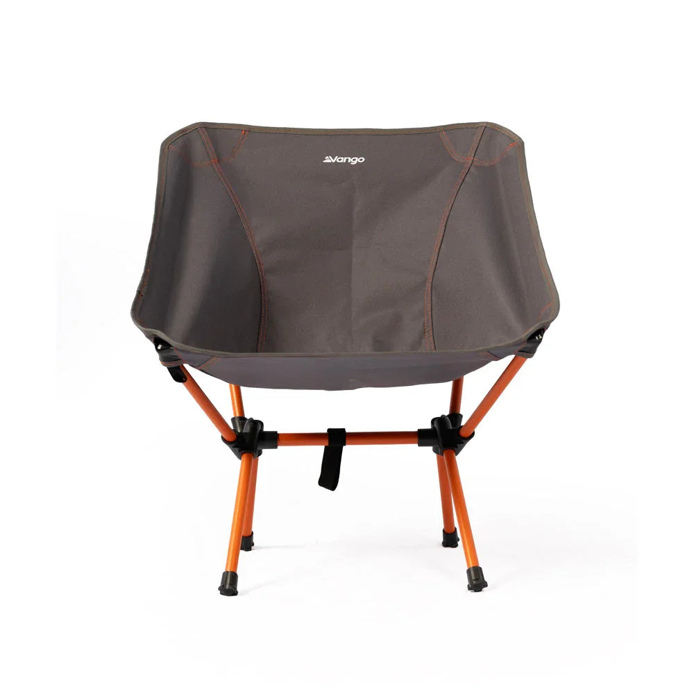 Vango portable camping chair with orange frame, ideal for outdoor adventures and caravanning trips