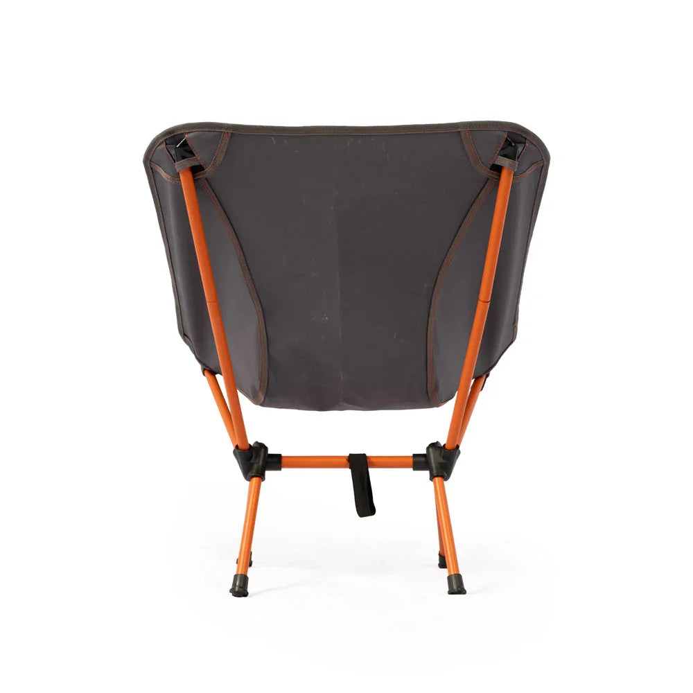 Portable camping chair with orange frame and gray fabric, ideal for outdoor adventures.