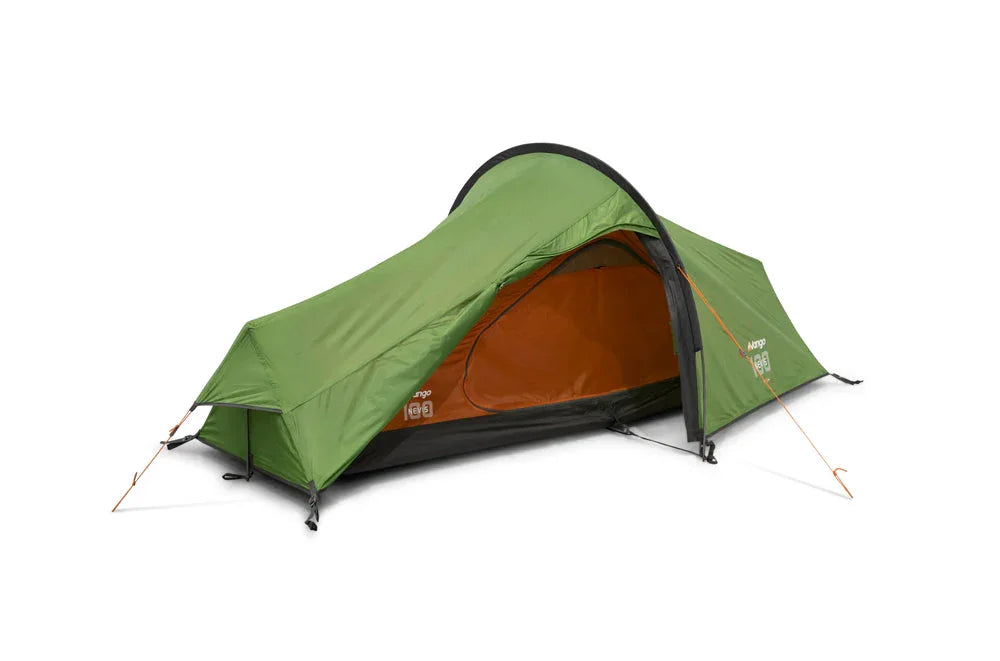 Green camping tent with orange interior, ideal for outdoor adventures and camping trips.
