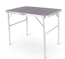 Portable folding camping table with aluminum frame and gray tabletop for outdoor adventures