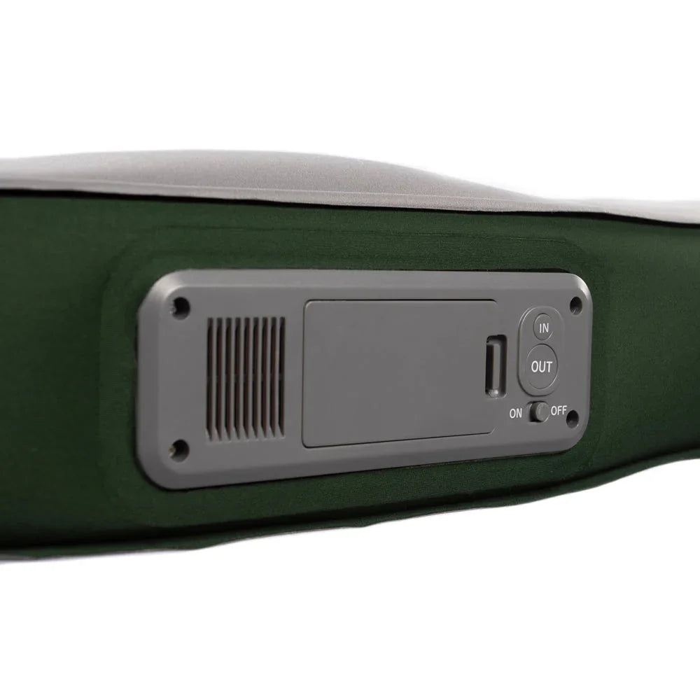 Green camping pillow with built-in USB charging port and power switch for outdoor adventures