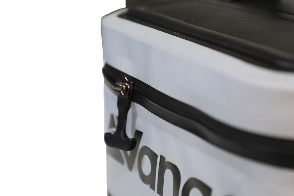 Close-up of a white cooler bag with a black zipper and 'Jansport' branding.